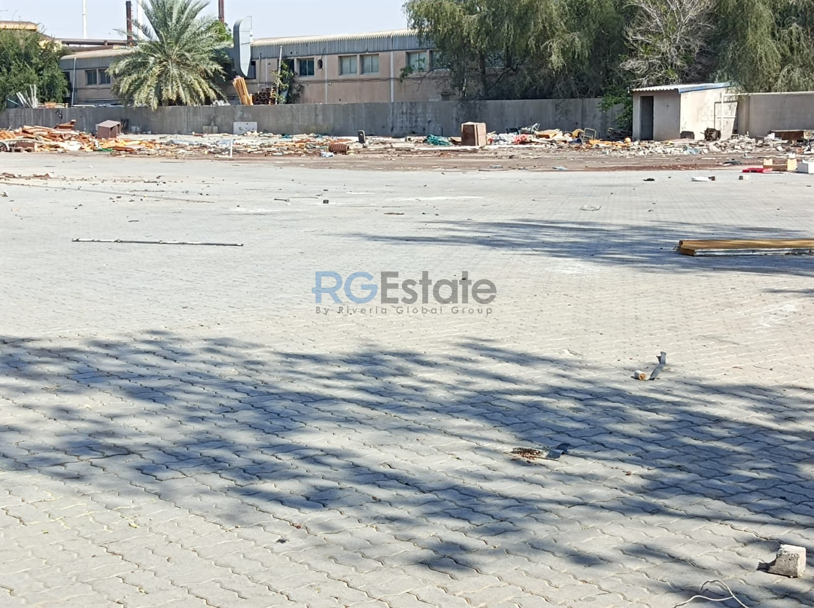 Rented 40,000 Sq.Ft Industrial Land with Warehouse & Office for Sale in Al Qouz  | RGEstate UAE