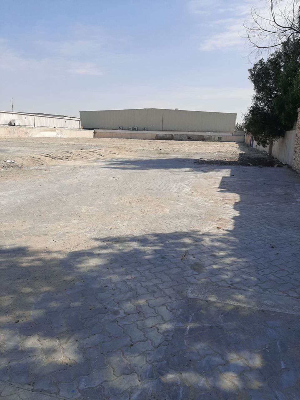 Main Road Facing 45,000 Sqft Industrial Land with G+M Showroom/Warehouse Permission in Al Quoz – For Sale  | RGEstate UAE