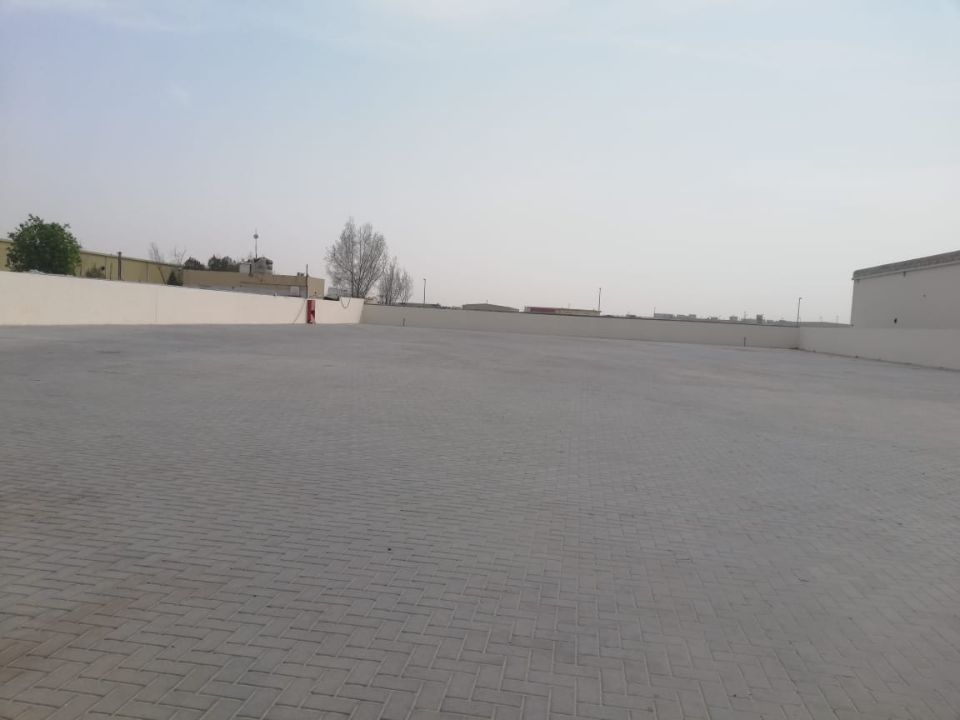 30,000 Sqft Industrial Land with Office & Boundary Wall (Fully Interlocked) For Rent in Sajja, Sharjah  | RGEstate UAE