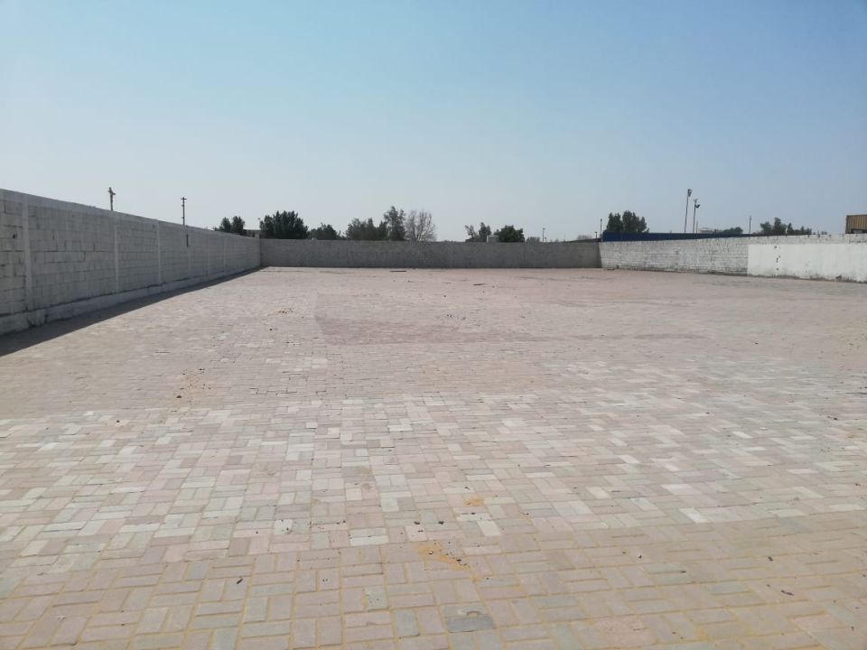 20,000 Sq Ft Industrial Land with Office & Fully Interlocked Boundary Wall for Rent in Sajja, Sharjah  | RGEstate UAE