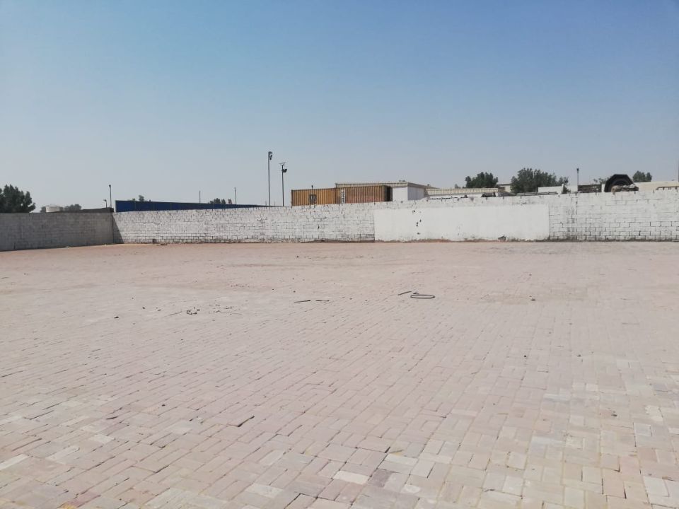 20,000 Sq Ft Industrial Land with Office & Fully Interlocked Boundary Wall for Rent in Sajja, Sharjah  | RGEstate UAE