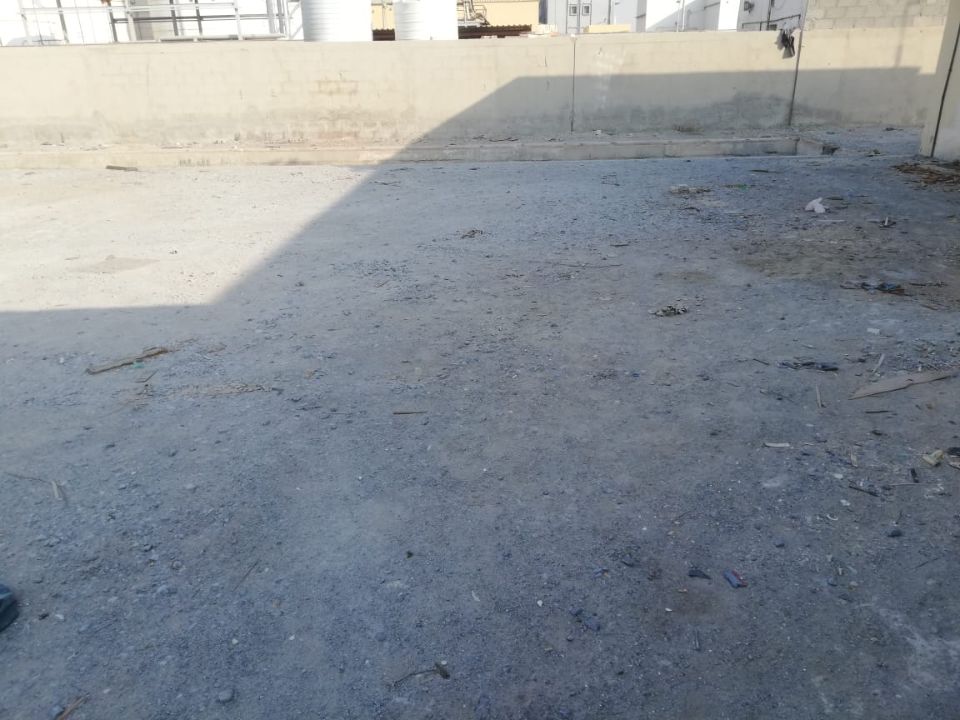 36,000 Sq. Ft. Industrial Land with Labour Rooms and Fully Concrete Boundary Wall for Rent in Umm Al Quwain  | RGEstate UAE