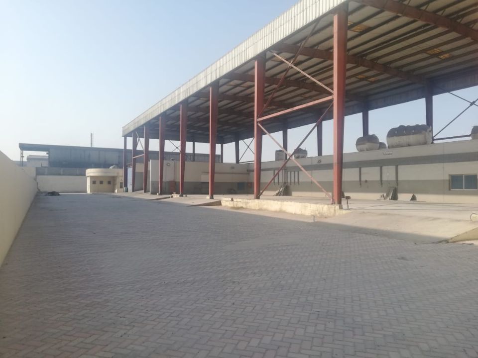 43,500 Sq. Ft. Industrial Land with Shed, Office, Shops & Labour Rooms for Sale in Umm Al Quwain  | RGEstate UAE